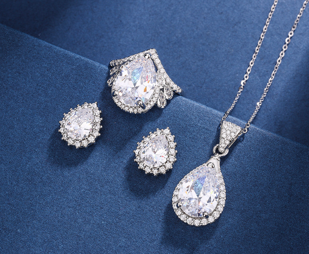 PLATINUM PLATED ZIRCON LUXURY PENDANT CHAIN EARRINGS AND RING SET BOX PACKED