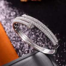 Car*ier Just en Cl Bangle