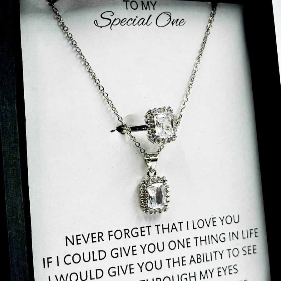 The diamond cut luxury set adjustable ring and pendant!