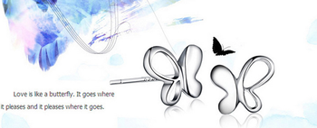 Silver colour butterfly style earrings