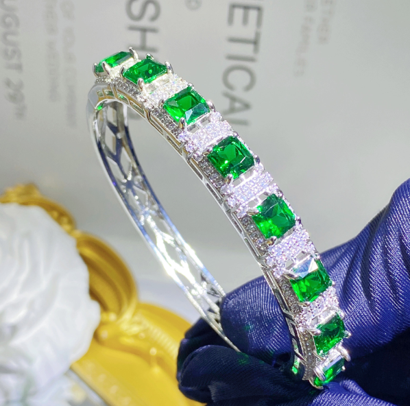Emerald look luxury rhodium plated exclusive bangle for her comes box packed