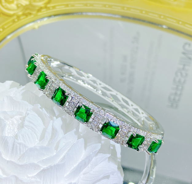 Emerald look luxury rhodium plated exclusive bangle for her comes box packed