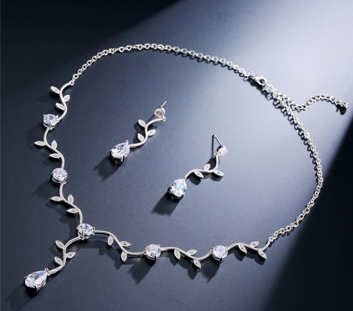 ARCTIC LEAF PATTERN LUXURY RHODIUM PLATED ZIRCON SET