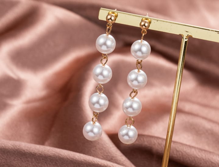 Rose gold colour pearl earrings