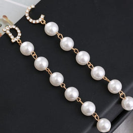 Rose gold colour pearl earrings