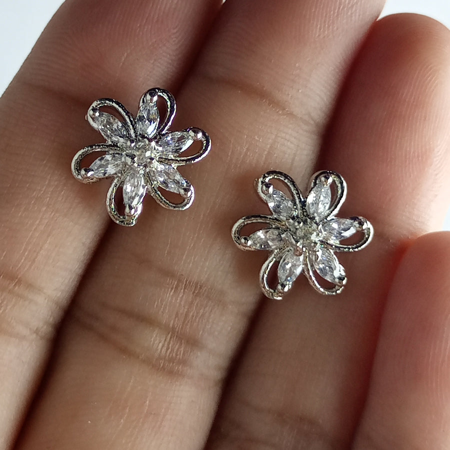 The diamond cut studs rhodium plated luxury earrings