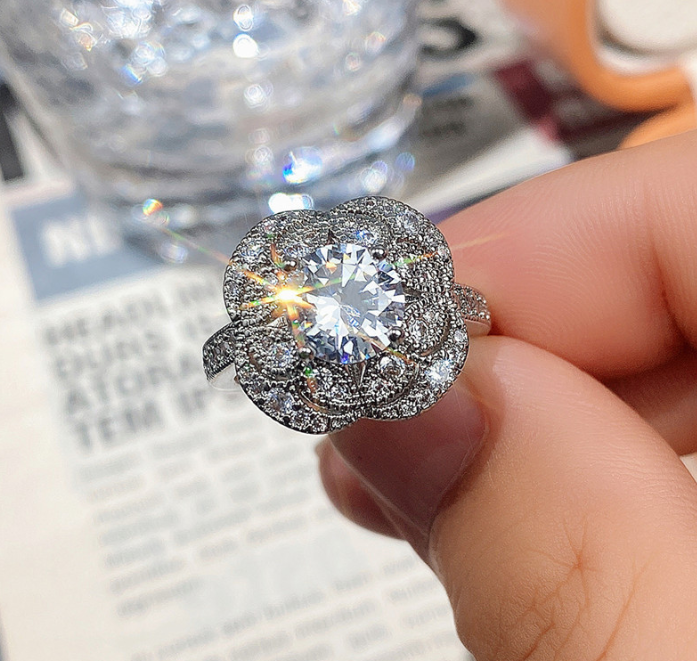 Diamond cut luxury ring with box packing